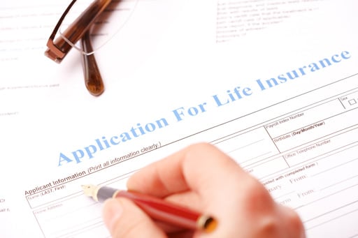 filling out life insurance form