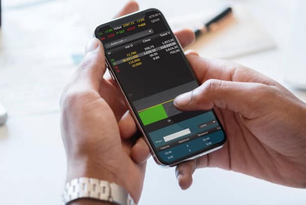 checking investments on smartphone